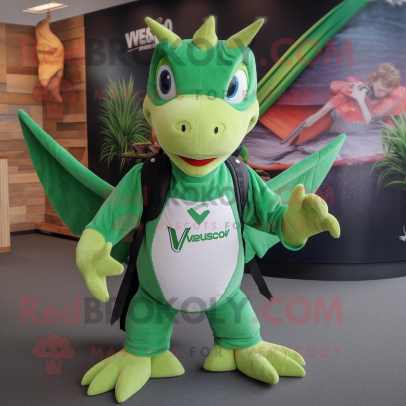Green Pterodactyl mascot costume character dressed with a V-Neck Tee and Backpacks