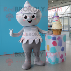 Silver Cupcake mascot costume character dressed with a Swimwear and Shoe clips