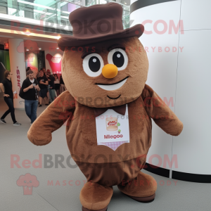 Brown Cupcake mascot costume character dressed with a Vest and Hats