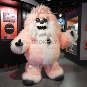 Peach Yeti mascot costume character dressed with a Leather Jacket and Shoe clips