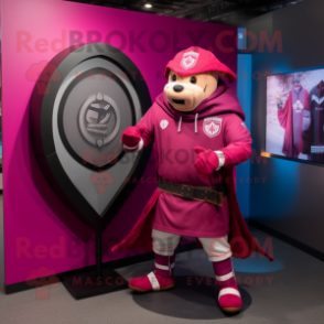 Magenta Celtic Shield mascot costume character dressed with a Bomber Jacket and Cummerbunds
