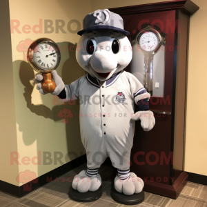 Silver Hourglass mascot costume character dressed with a Baseball Tee and Tie pins