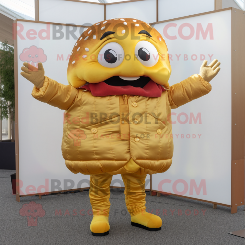 Gold Hamburger mascot costume character dressed with a Jacket and Gloves