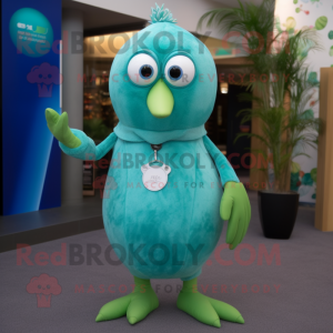 Cyan Kiwi mascot costume character dressed with a Dress Shirt and Keychains