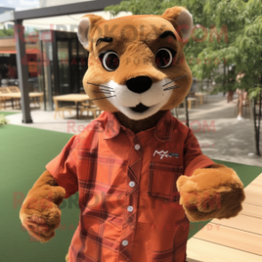 Rust Jaguarundi mascot costume character dressed with a Poplin Shirt and Hair clips