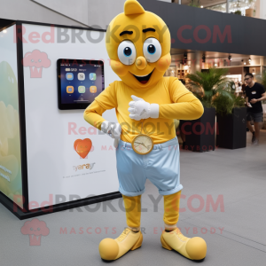 Gold Heart mascot costume character dressed with a Boyfriend Jeans and Smartwatches