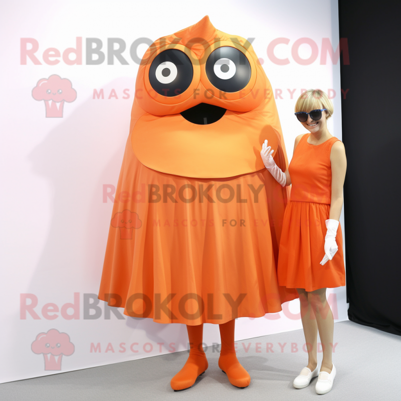 Orange Cyclops mascot costume character dressed with a Sheath Dress and Wraps