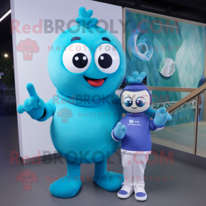 Cyan Aglet mascot costume character dressed with a Sweater and Smartwatches