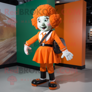 Orange Irish Dancer mascot costume character dressed with a Blazer and Messenger bags
