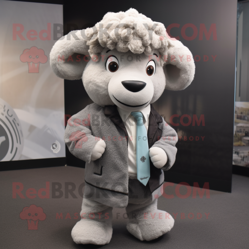 Gray Ram mascot costume character dressed with a Suit Jacket and Headbands