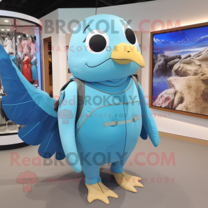 Sky Blue Dove mascot costume character dressed with a One-Piece Swimsuit and Backpacks