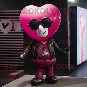 Magenta Heart Shaped Balloons mascot costume character dressed with a Leather Jacket and Pocket squares