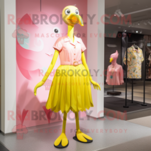 Yellow Flamingo mascot costume character dressed with a A-Line Dress and Belts