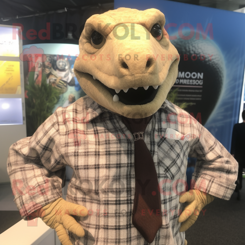 Tan Komodo Dragon mascot costume character dressed with a Flannel Shirt and Tie pins