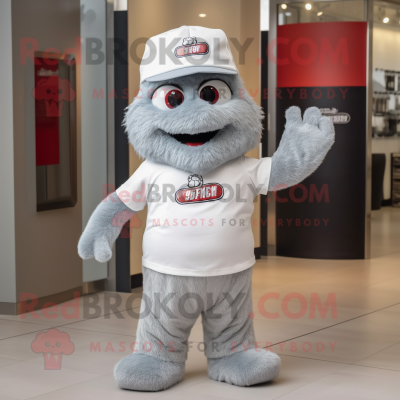 Silver Raspberry mascot costume character dressed with a T-Shirt and Hat pins