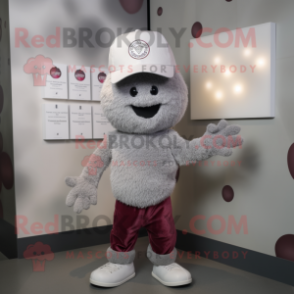 Silver Raspberry mascot costume character dressed with a T-Shirt and Hat pins