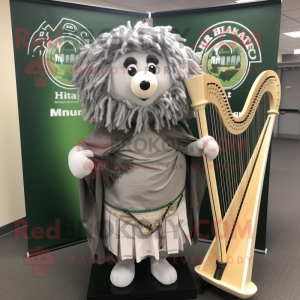 Gray Celtic Harp mascot costume character dressed with a Dress Shirt and Shawl pins