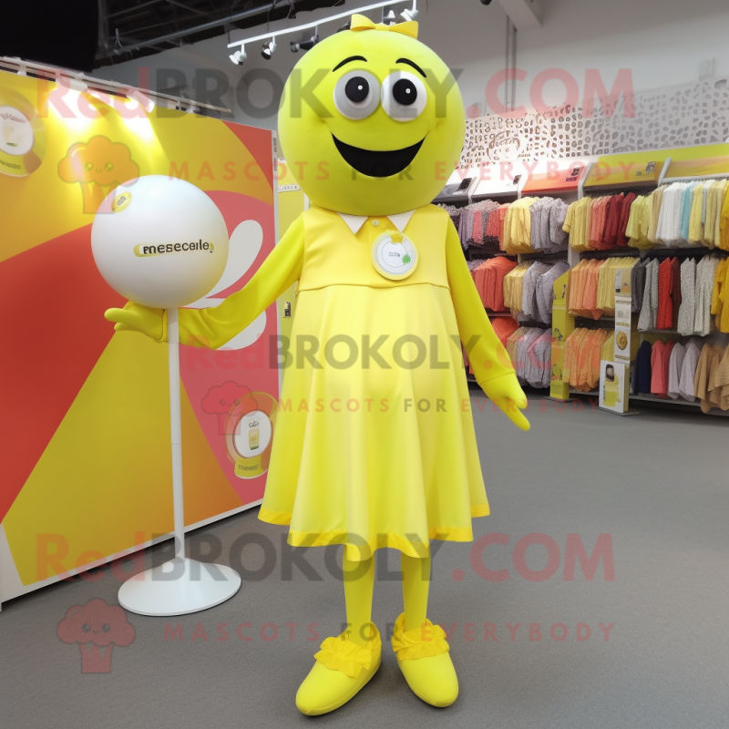 Lemon Yellow Juggle mascot costume character dressed with a A-Line Dress and Tie pins