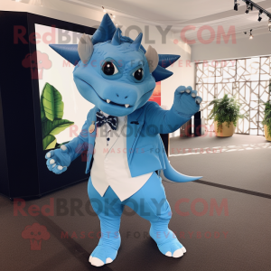 Sky Blue Triceratops mascot costume character dressed with a Tuxedo and Backpacks