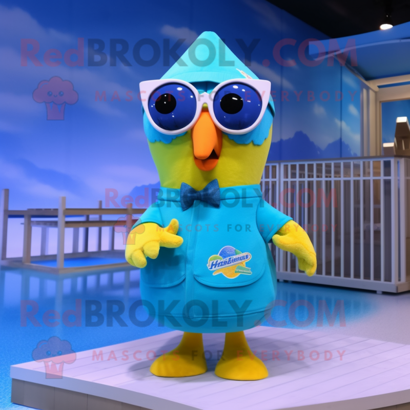 Cyan Canary mascot costume character dressed with a Swimwear and Sunglasses