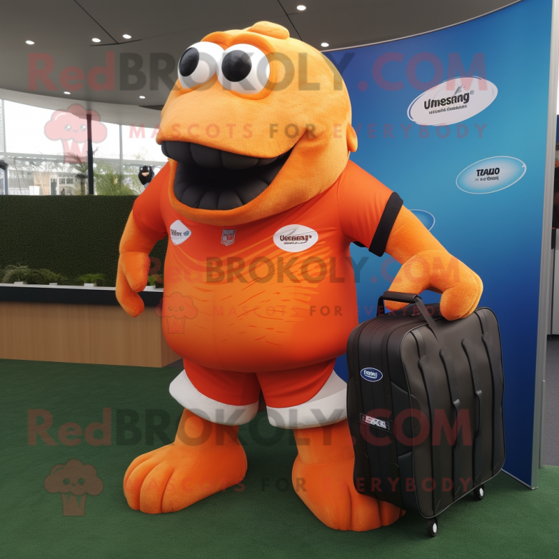 Orange Salmon mascot costume character dressed with a Rugby Shirt and Briefcases