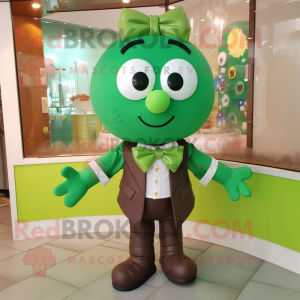 Green Chocolates mascot costume character dressed with a Romper and Bow ties