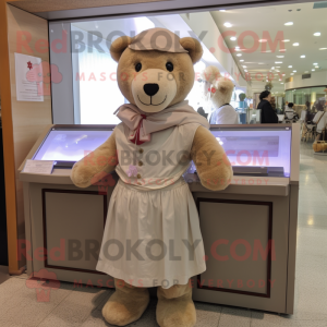 Beige Teddy Bear mascot costume character dressed with a A-Line Skirt and Shawls