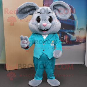 Turquoise Chinchilla mascot costume character dressed with a Suit and Shoe clips