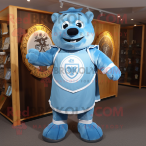 Sky Blue Celtic Shield mascot costume character dressed with a Dungarees and Mittens