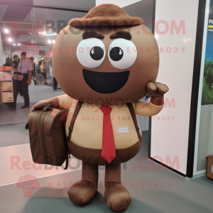 Brown Meatballs mascot costume character dressed with a Blouse and Briefcases