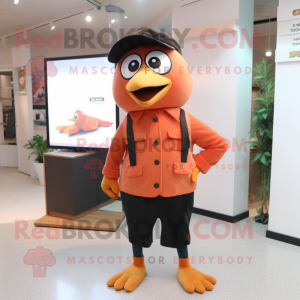 Peach Blackbird mascot costume character dressed with a Overalls and Cufflinks