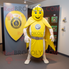 Lemon Yellow Celtic Shield mascot costume character dressed with a Suit and Shawl pins