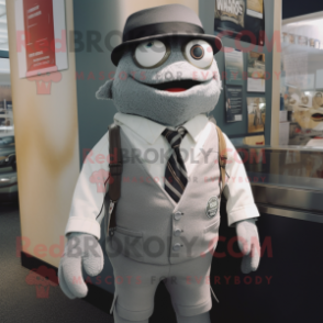 Gray Cod mascot costume character dressed with a Henley Tee and Ties