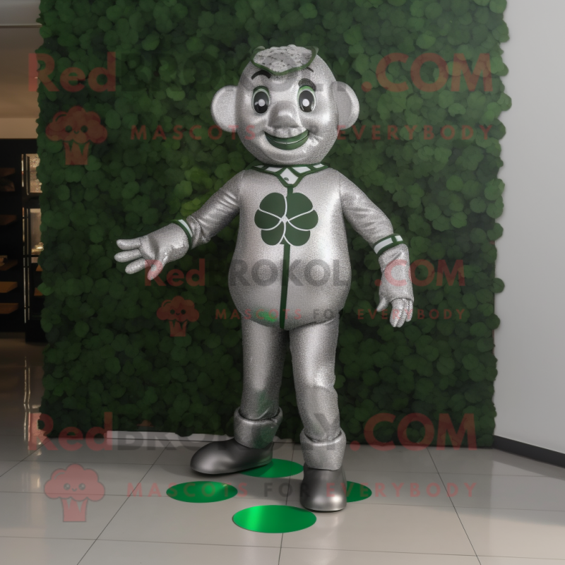 Silver Four Leaf Clover mascot costume character dressed with a Suit and Foot pads