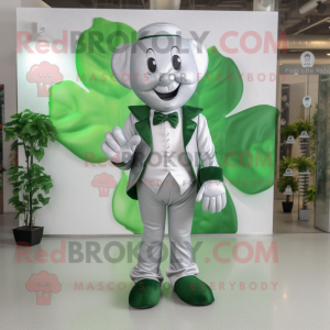 Silver Four Leaf Clover mascot costume character dressed with a Suit and Foot pads