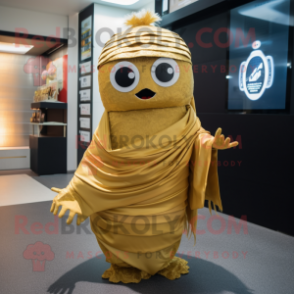 Gold Sushi mascot costume character dressed with a Culottes and Shawl pins