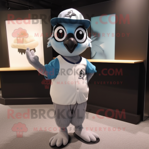 Gray Blue Jay mascot costume character dressed with a Polo Shirt and Hair clips