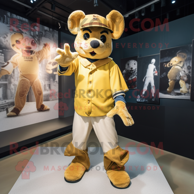 Gold Bat mascot costume character dressed with a Henley Tee and Gloves