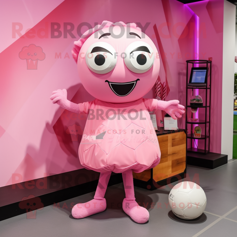 Pink Soccer Ball mascot costume character dressed with a Skirt and Clutch bags