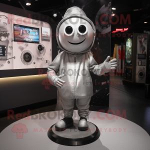 Silver Gyro mascot costume character dressed with a Suit and Mittens