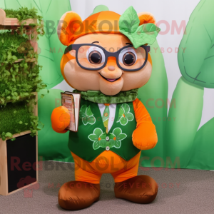 Orange Bunch Of Shamrocks mascot costume character dressed with a Vest and Reading glasses