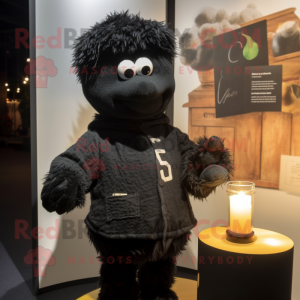 Black Scented Candle mascot costume character dressed with a Cardigan and Ties