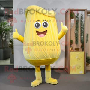 Lemon Yellow Candy Box mascot costume character dressed with a Corduroy Pants and Clutch bags