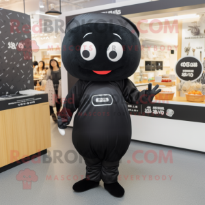 Black Miso Soup mascot costume character dressed with a Jumpsuit and Shoe clips