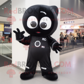 Black Miso Soup mascot costume character dressed with a Jumpsuit and Shoe clips