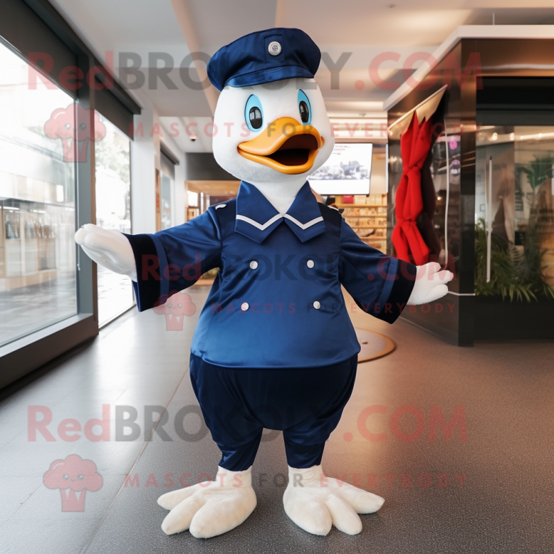 Navy Geese mascot costume character dressed with a Long Sleeve Tee and Caps