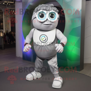 Silver Cyclops mascot costume character dressed with a Joggers and Smartwatches