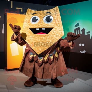 Brown Nachos mascot costume character dressed with a Maxi Dress and Belts