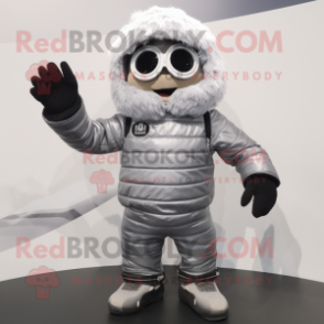 Silver Shakshuka mascot costume character dressed with a Moto Jacket and Mittens