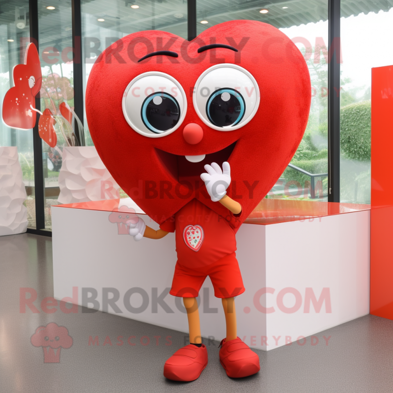 Red Heart mascot costume character dressed with a Shorts and Anklets